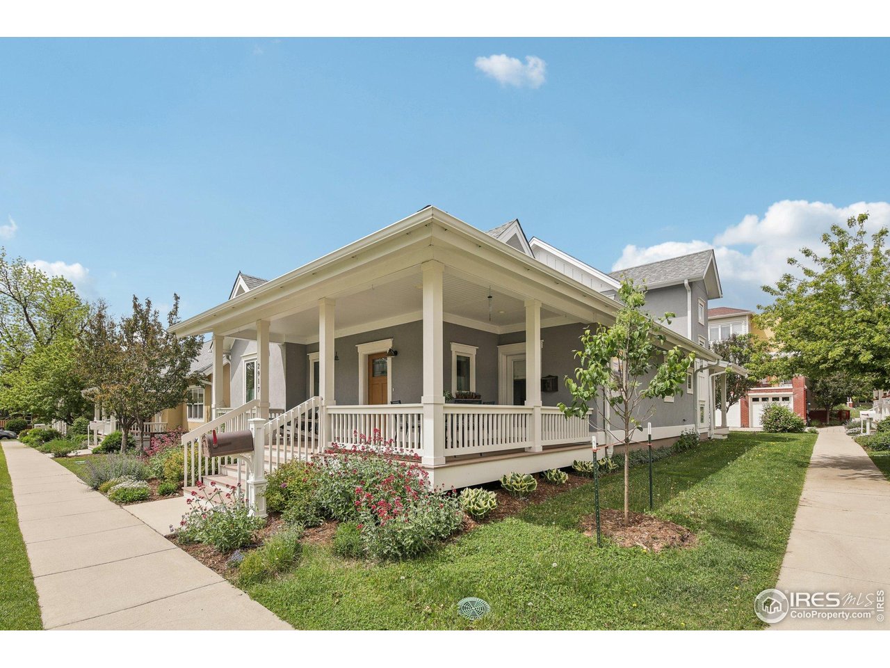2917 13th Street Boulder, CO 80304 - Photo 2 of 40 a view of a house with a yard