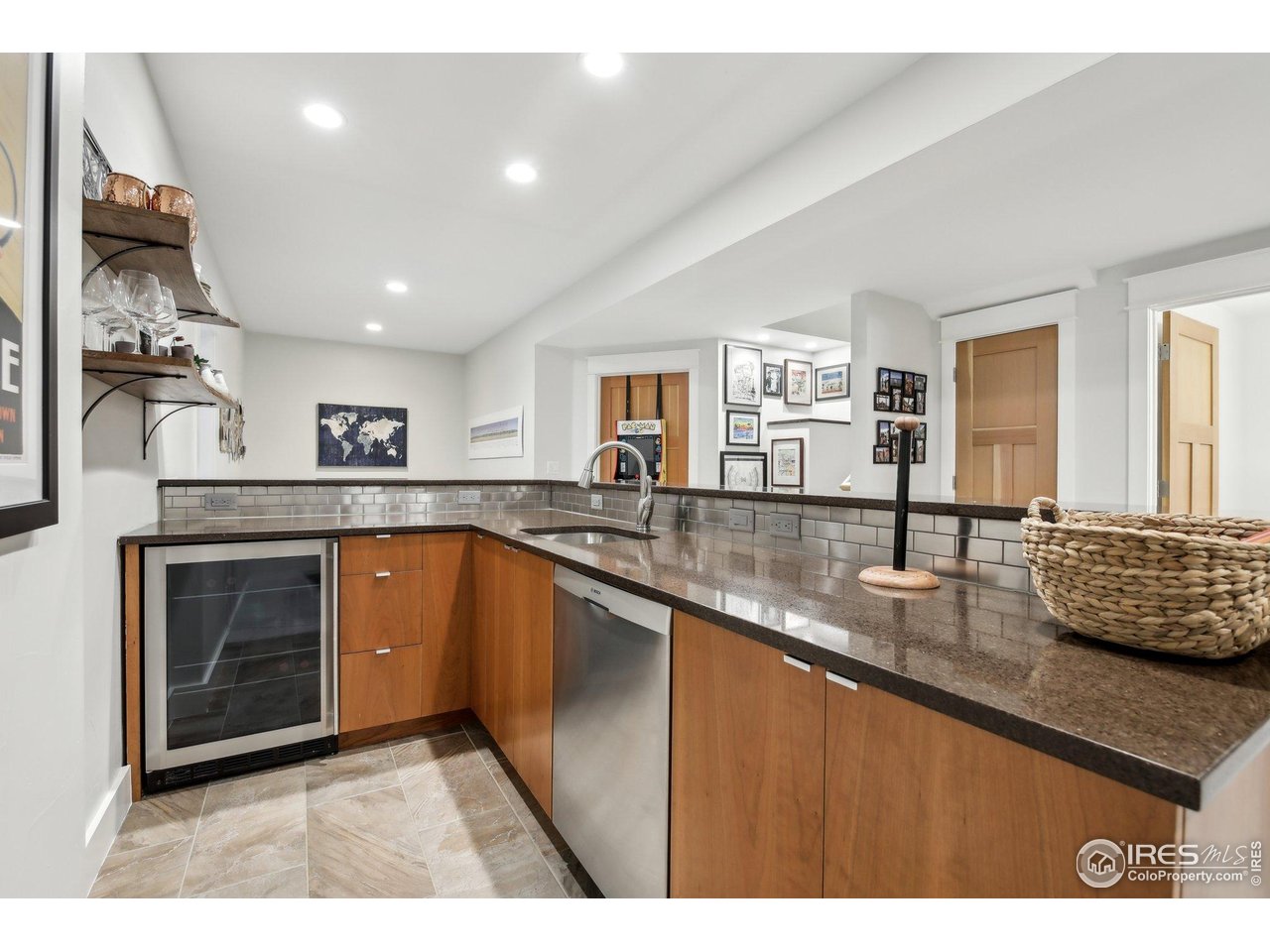 2917 13th Street Boulder, CO 80304 - Photo 22 of 40 a kitchen with stainless steel appliances granite countertop a sink and stove