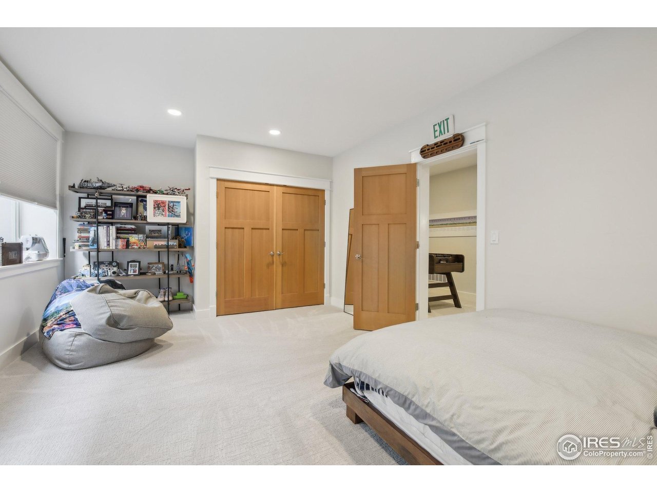 2917 13th Street Boulder, CO 80304 - Photo 28 of 40 a bedroom with a bed and a window