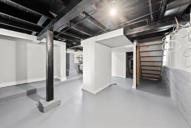 a view of a hallway with staircase