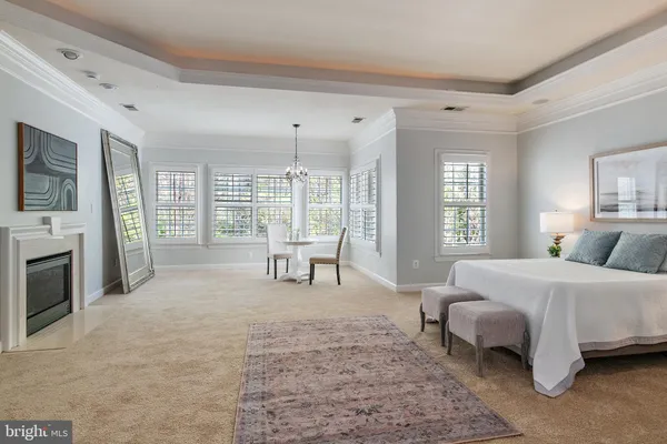 a view of a room with a wooden floor