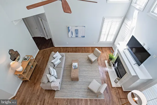 front view of a house with a yard table and chairs