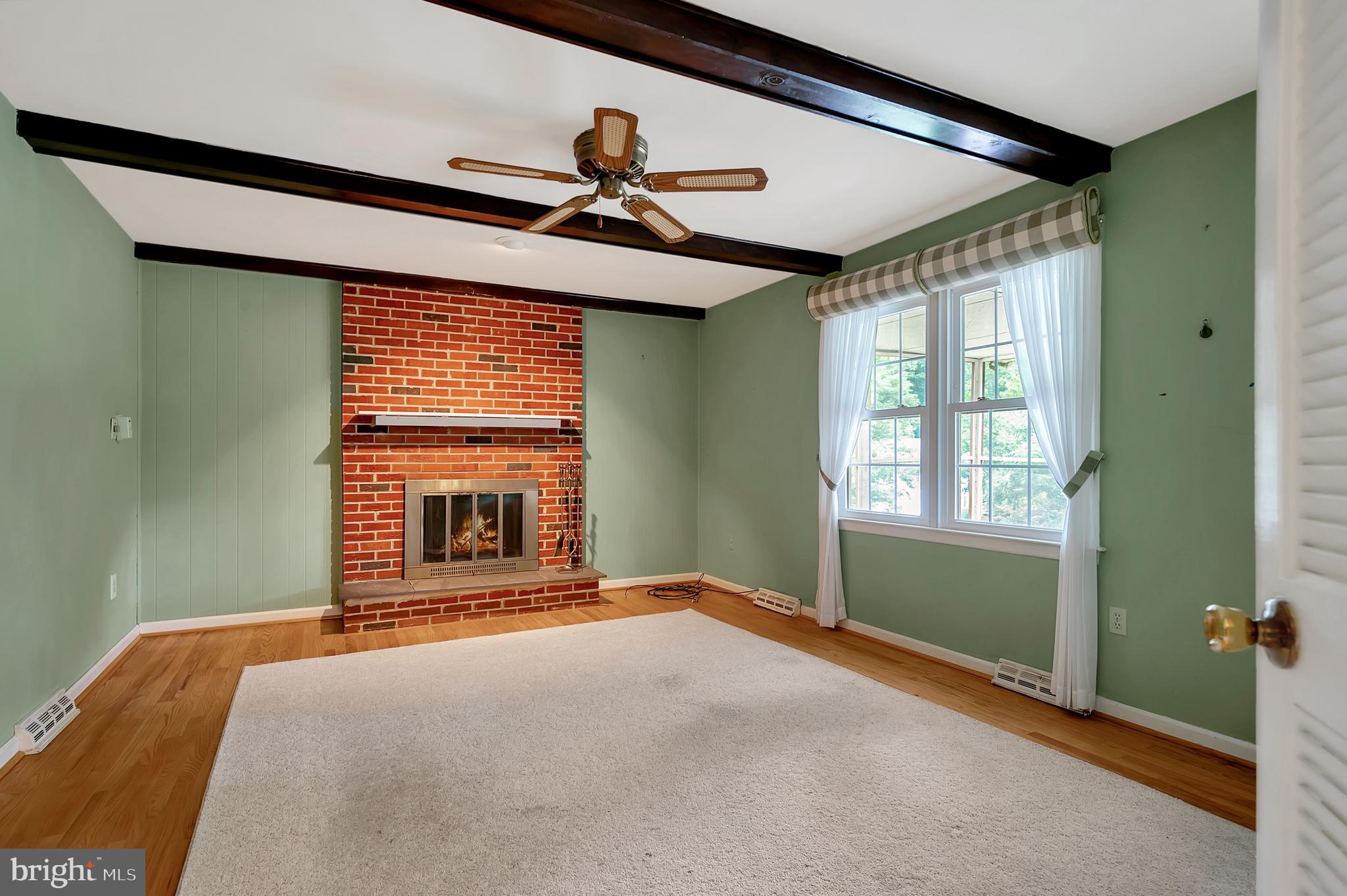19 Chadd Road Newark, DE 19711 - Photo 15 of 35 Family room with cozy brick fireplace