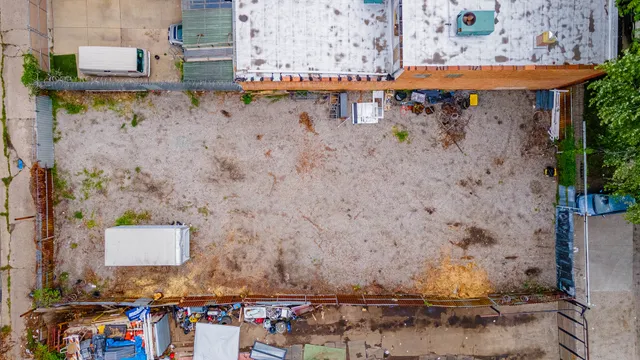 view of a stone wall with an outdoor space