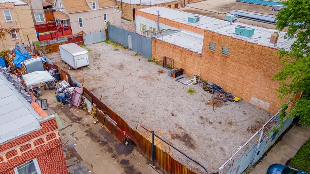 a view of a terrace with wooden floor and seating space