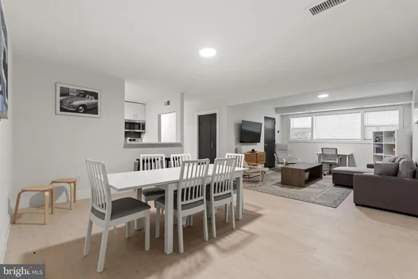 a view of a dining room with furniture