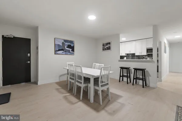 a view of a dining room with furniture