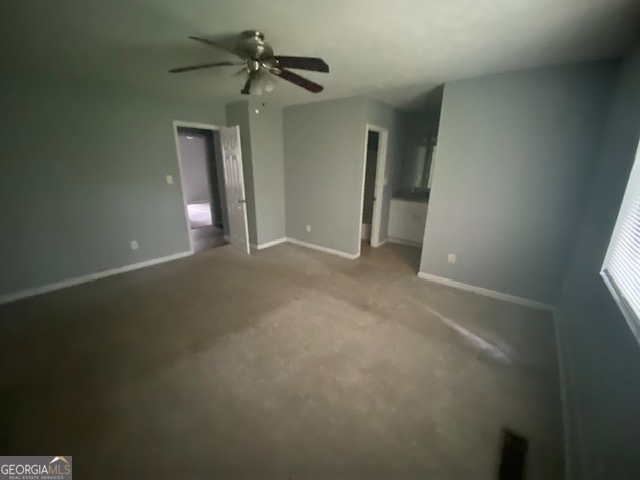 5389 Martins Crossing Road Stone Mountain, GA 30088 - Photo 17 of 30 a view of a livingroom with a ceiling fan and window