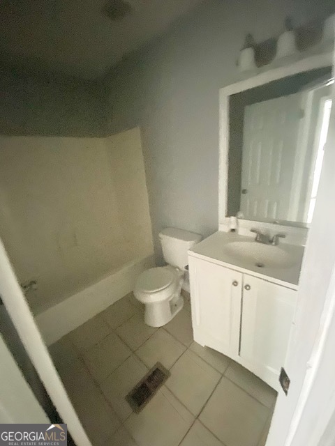 5389 Martins Crossing Road Stone Mountain, GA 30088 - Photo 21 of 30 a bathroom with a sink a toilet and a mirror