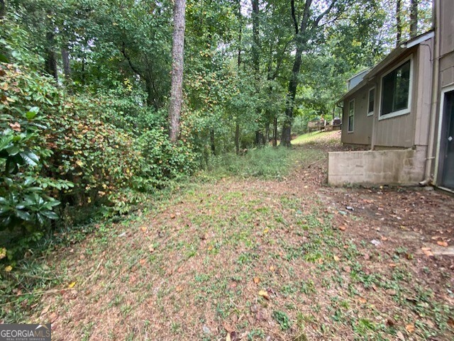 5389 Martins Crossing Road Stone Mountain, GA 30088 - Photo 25 of 30 a view of a back yard