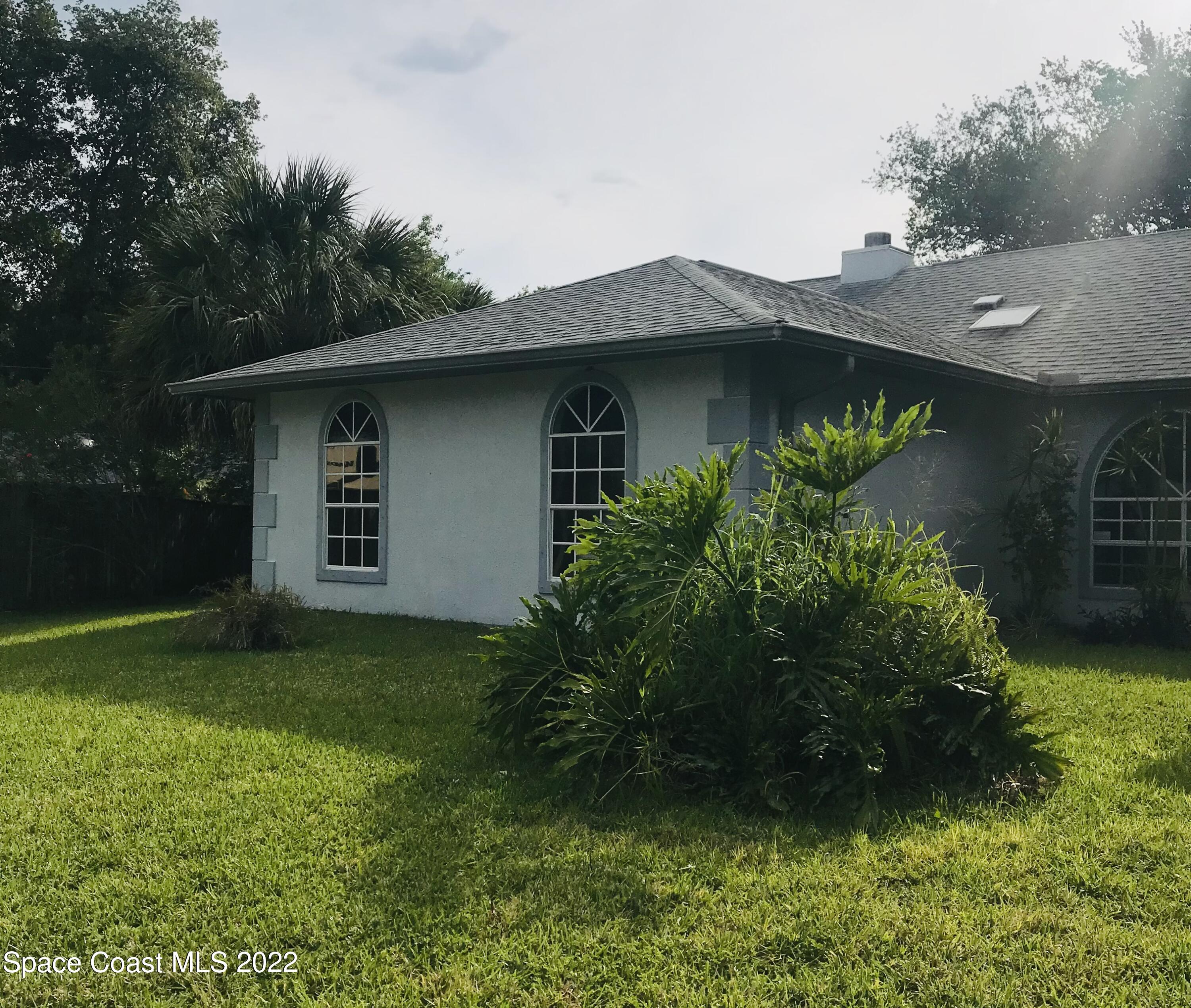 200 Southeast Rios Court Palm Bay, FL 32909 - Photo 17 of 18 Front house South