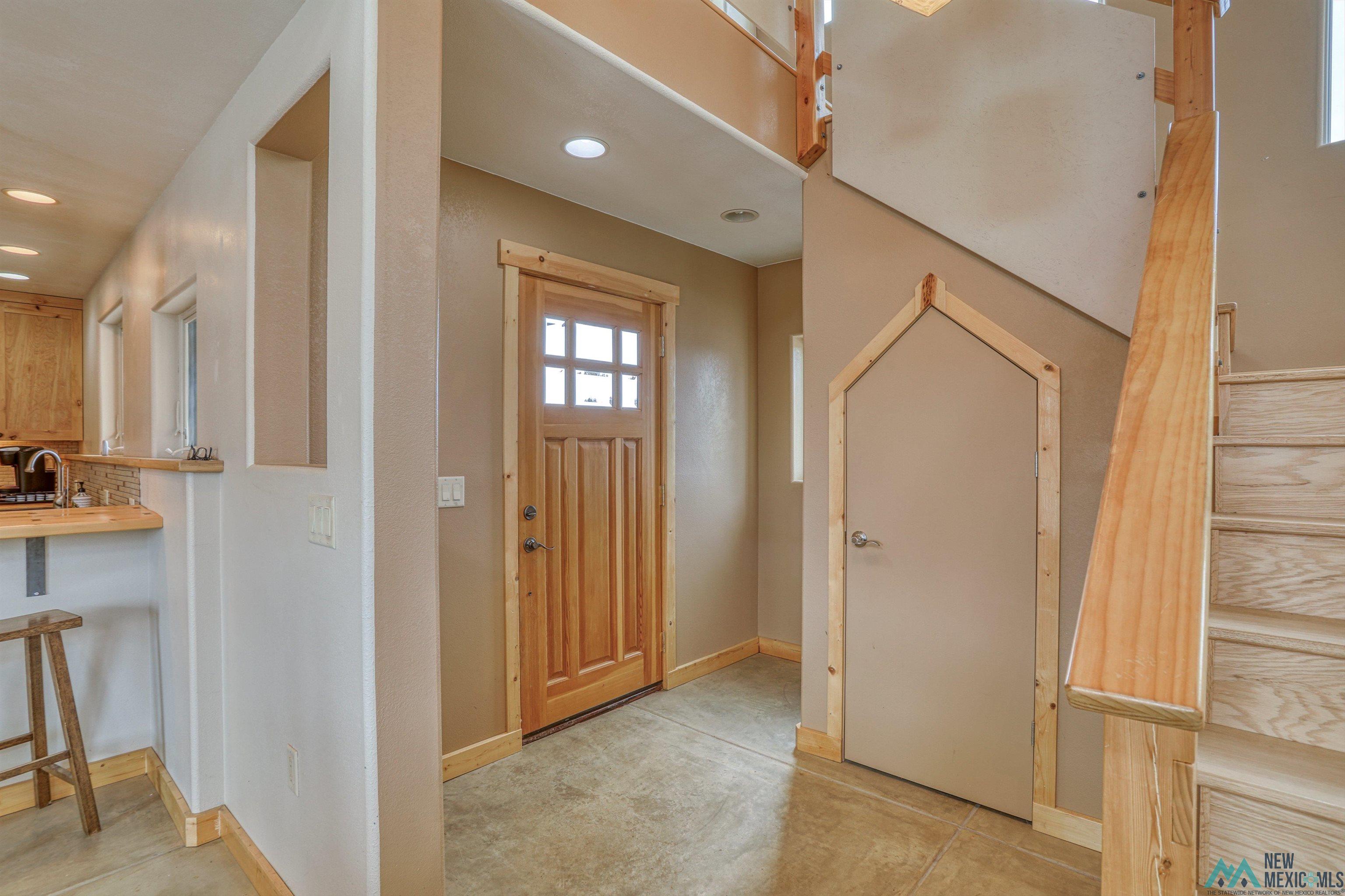 12 Horn Toad Road Chama, NM 87520 - Photo 4 of 52 Foyer entrance with stairway and recessed lighting
