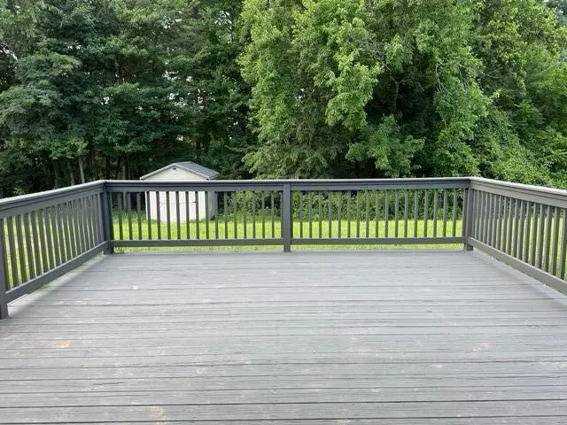 a view of a wooden fence