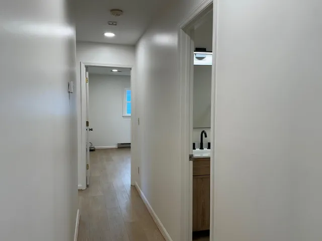 hallway with wooden floor