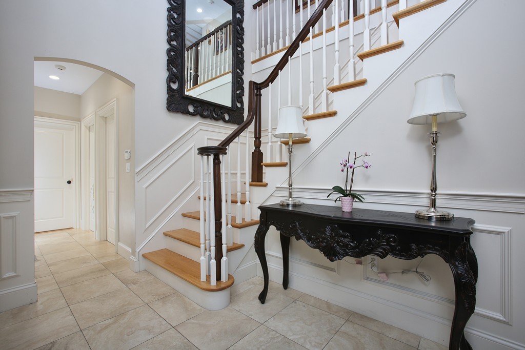 100 Drumlin Road Newton, MA 02459 - Photo 6 of 24 a view of entryway and hall