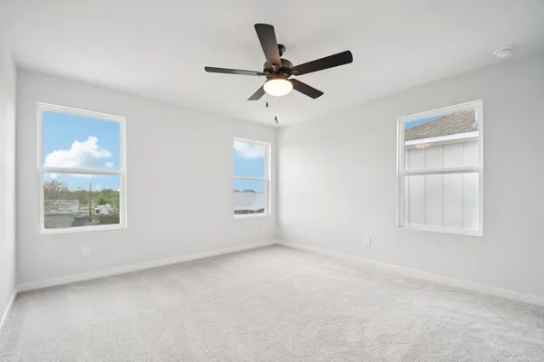 a bathroom with a shower sink and mirror