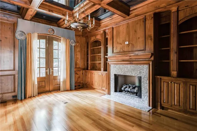 a kitchen with stainless steel appliances a stove a sink and a refrigerator