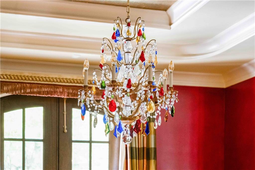 3558 Mill Creek Road Northeast Atlanta, GA 30319 - Photo 15 of 88 a vase of flowers sitting on a table with a potted plant