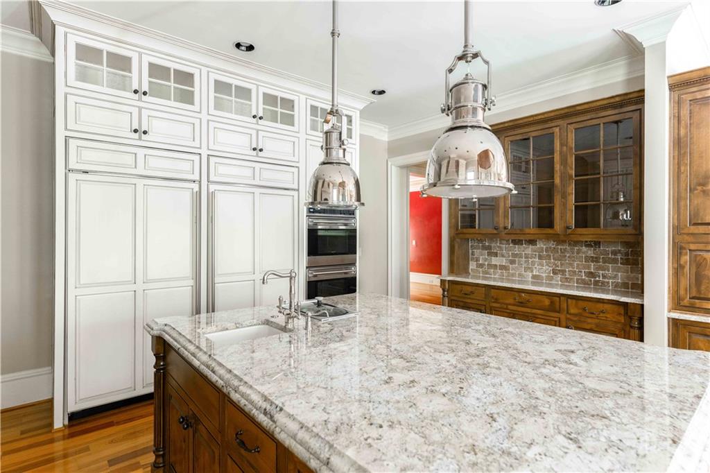 3558 Mill Creek Road Northeast Atlanta, GA 30319 - Photo 17 of 88 a view of a kitchen with stainless steel appliances granite countertop a sink and cabinets