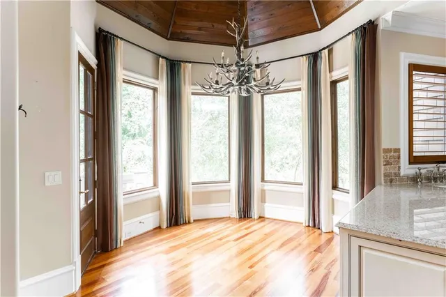a bathroom with a glass door shower