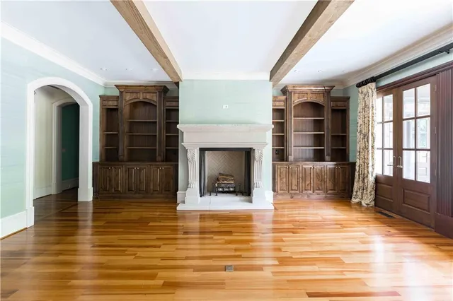 a view of deck with furniture and trees