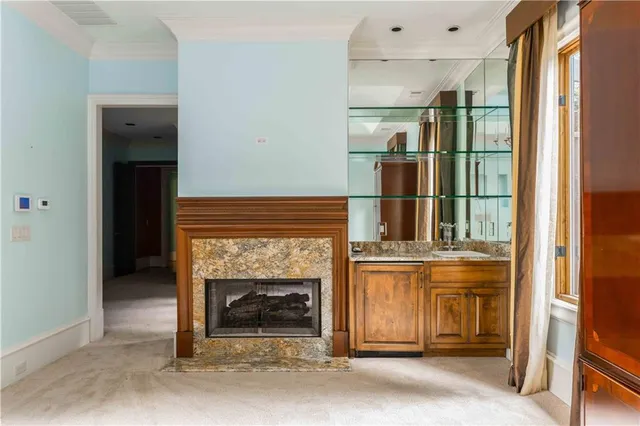 a view of an empty room with walk in closet