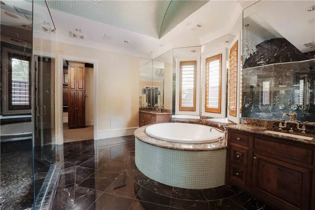 a kitchen with a refrigerator and a sink