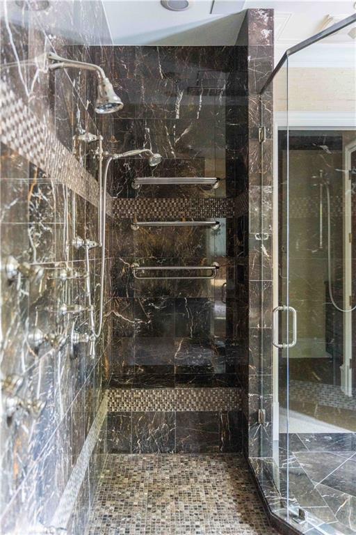 3558 Mill Creek Road Northeast Atlanta, GA 30319 - Photo 40 of 88 a bathroom with a glass door shower