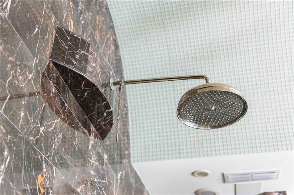 3558 Mill Creek Road Northeast Atlanta, GA 30319 - Photo 41 of 88 a bathroom with a toilet and a sink