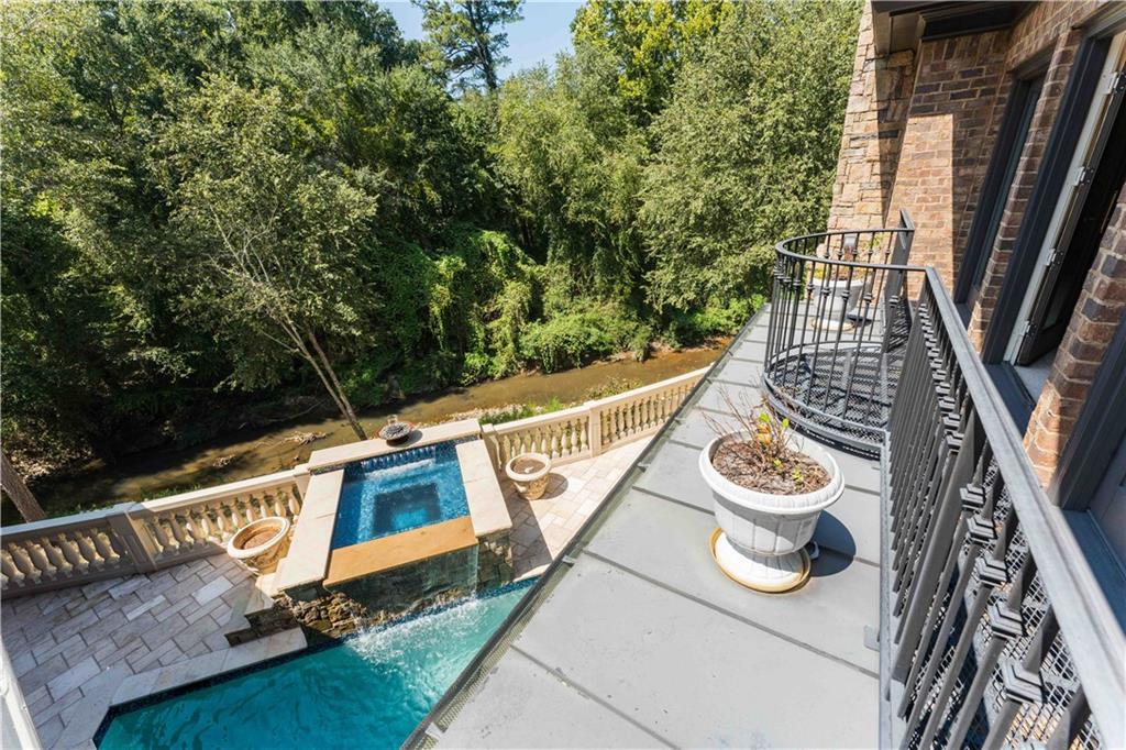 3558 Mill Creek Road Northeast Atlanta, GA 30319 - Photo 49 of 88 a view of deck with furniture and trees