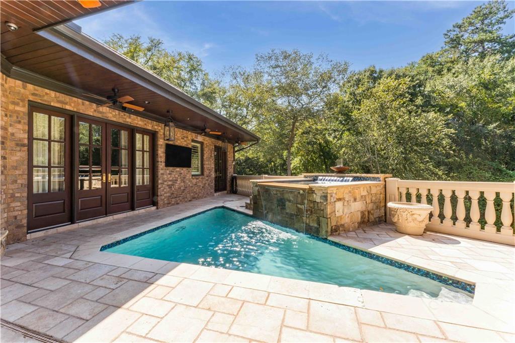 3558 Mill Creek Road Northeast Atlanta, GA 30319 - Photo 59 of 88 a view of a house with backyard and sitting area