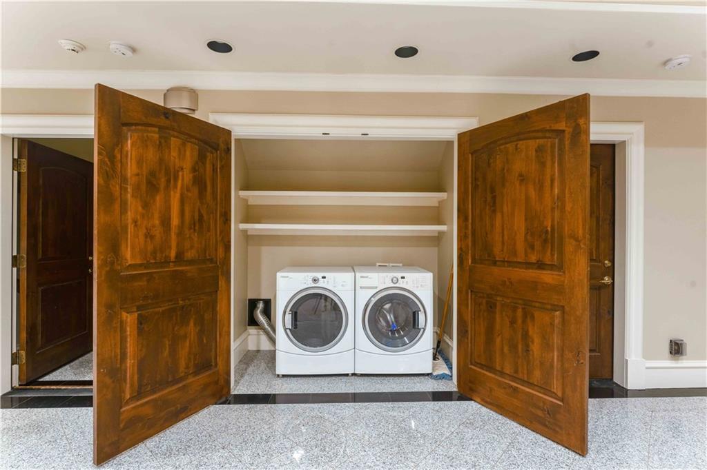 3558 Mill Creek Road Northeast Atlanta, GA 30319 - Photo 66 of 88 a utility room with dryer and washer