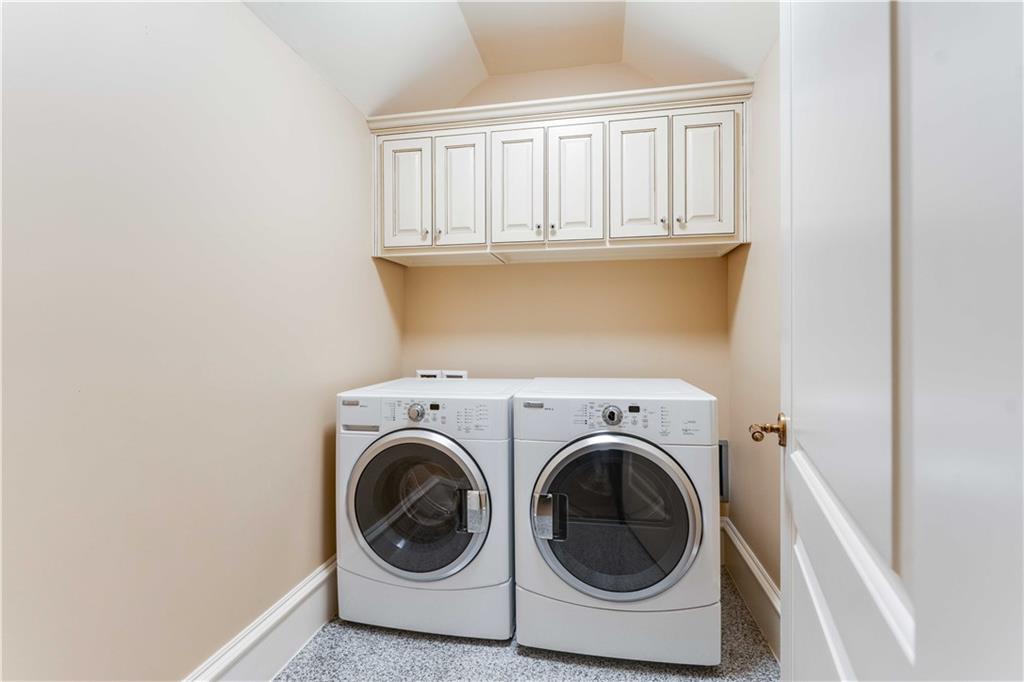 3558 Mill Creek Road Northeast Atlanta, GA 30319 - Photo 75 of 88 a utility room with dryer and washer