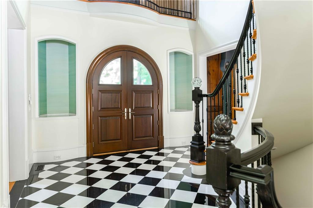 3558 Mill Creek Road Northeast Atlanta, GA 30319 - Photo 9 of 88 a view of a entryway door with a rug