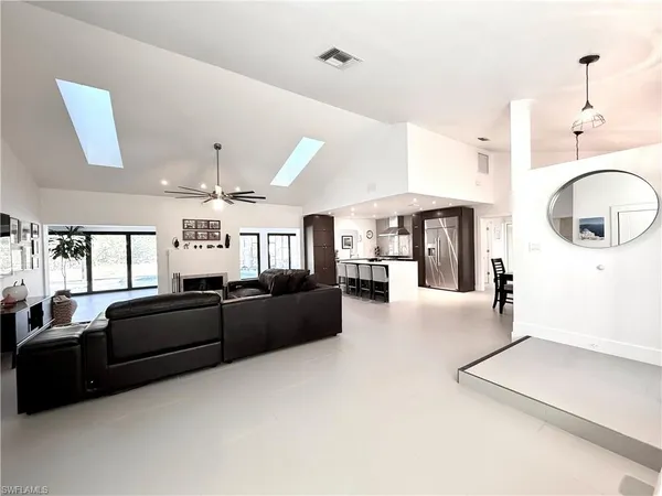 a large living room with a large window