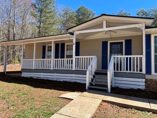 102 Holly Hill Road Jasper, GA 30143 - Photo 1 of 1 a view of a house with wooden fence