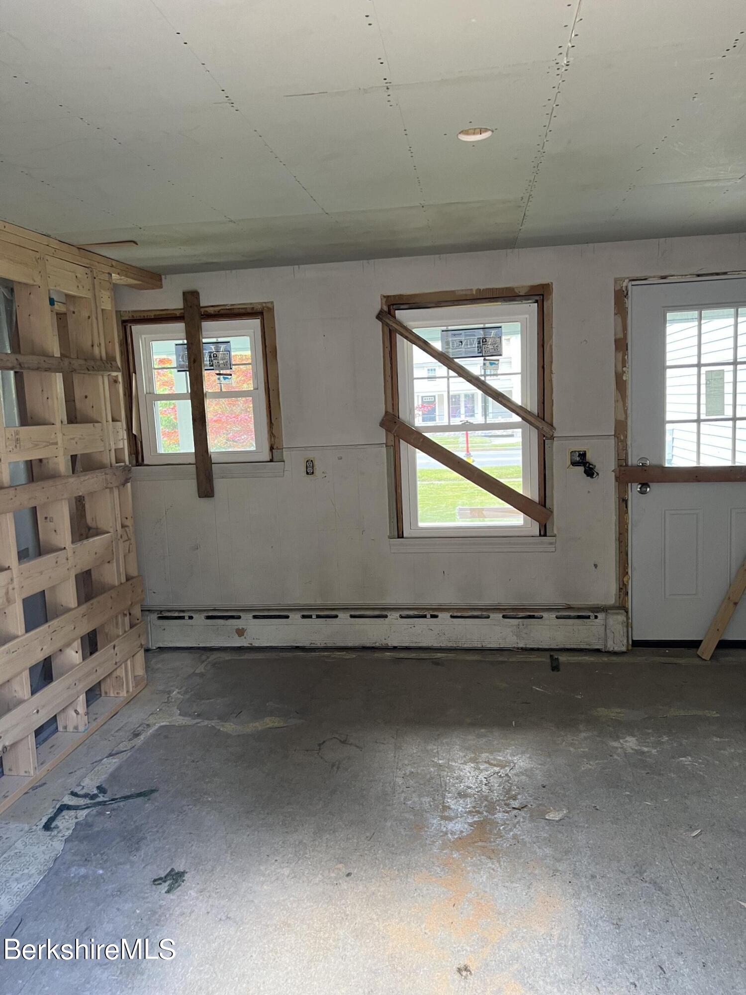 111 Columbia Street Adams, MA 01220 - Photo 11 of 21 an empty room with windows