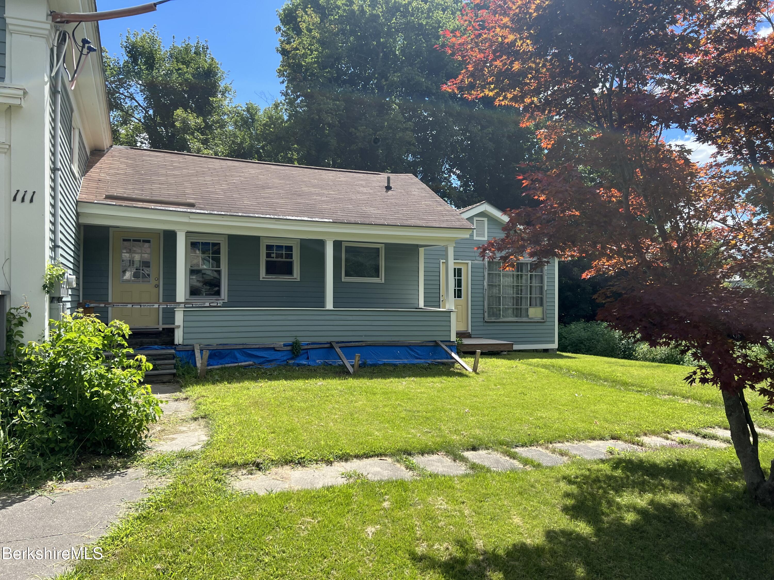 111 Columbia Street Adams, MA 01220 - Photo 2 of 21 a view of a house with a yard porch and sitting area