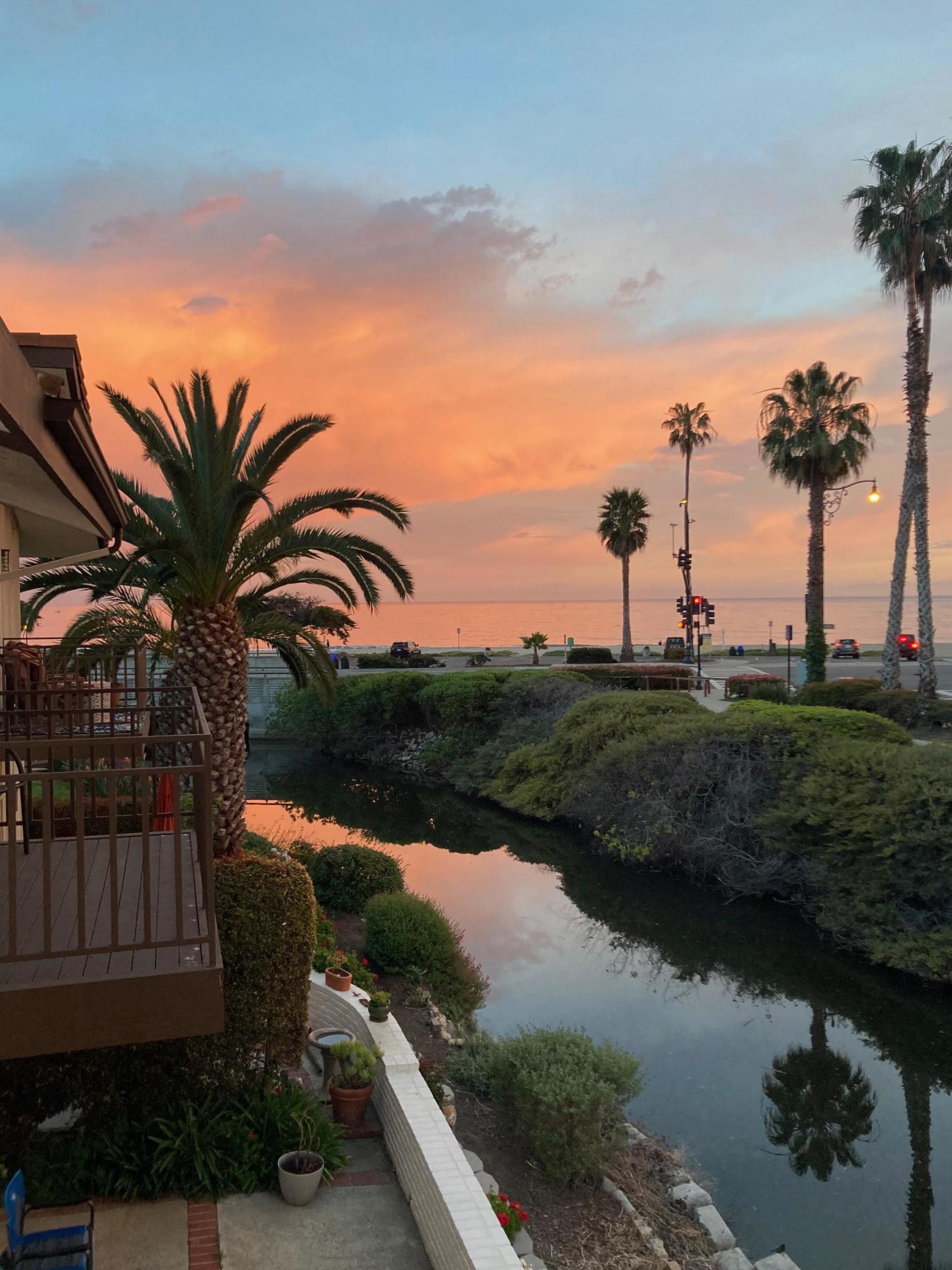 671 Del Parque Drive Santa Barbara, CA 93103 - Photo 1 of 18 a view of a lake with a yard
