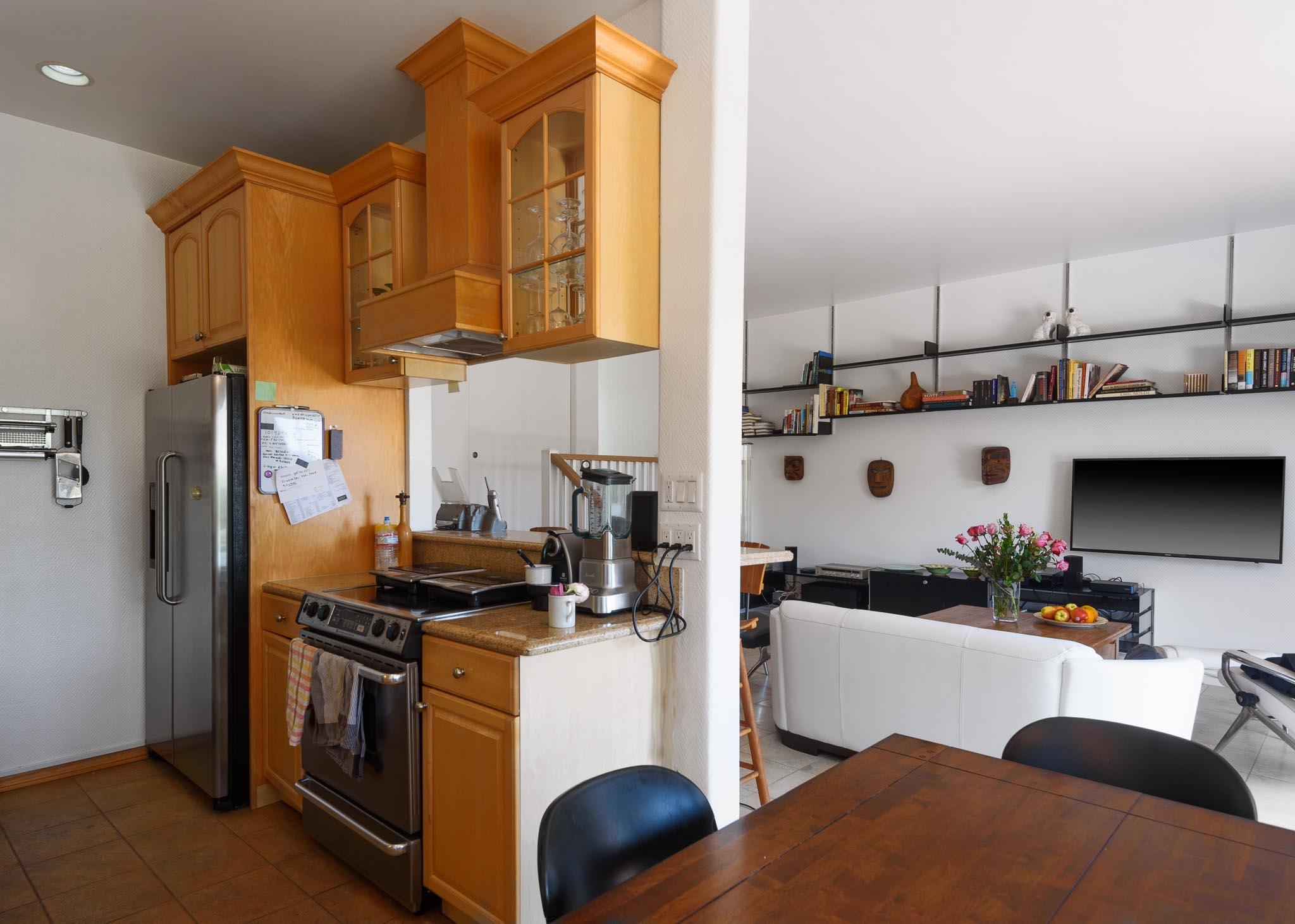671 Del Parque Drive Santa Barbara, CA 93103 - Photo 11 of 18 a kitchen that has a lot of cabinets in it