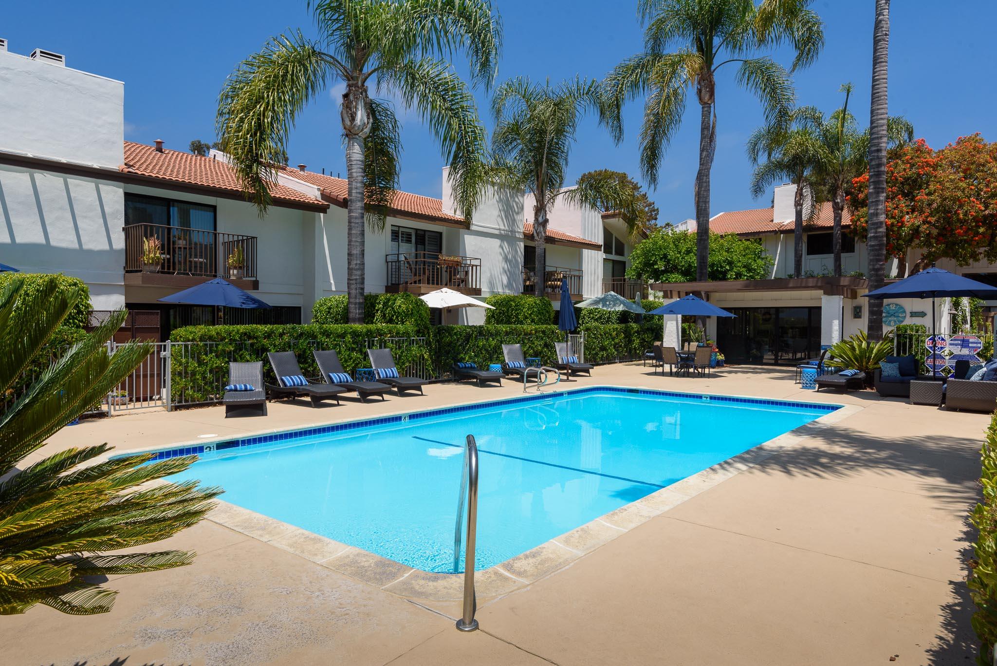671 Del Parque Drive Santa Barbara, CA 93103 - Photo 13 of 18 a front view of house and yard with swimming pool and outdoor seating