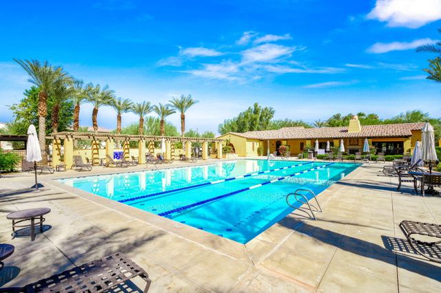 a view of a house with swimming pool