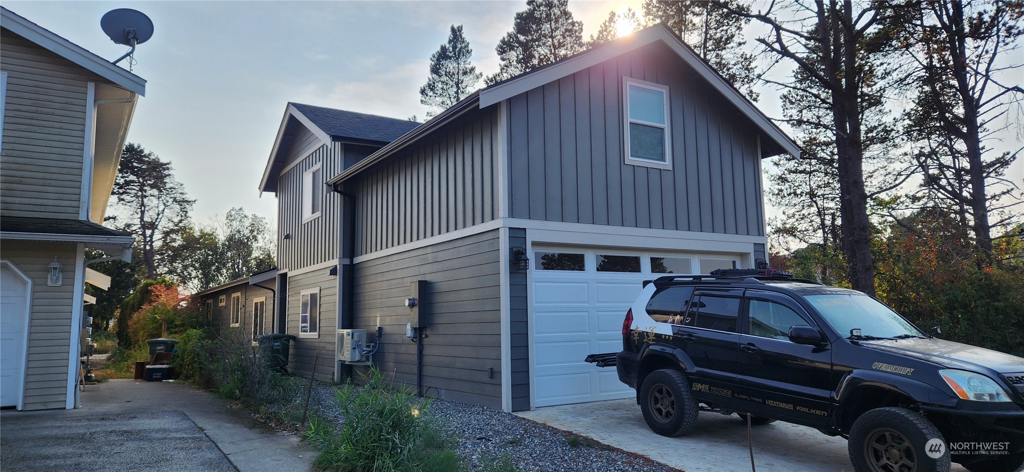 702 E Street Blaine, WA 98230 - Photo 3 of 4 a front view of a house with parking space