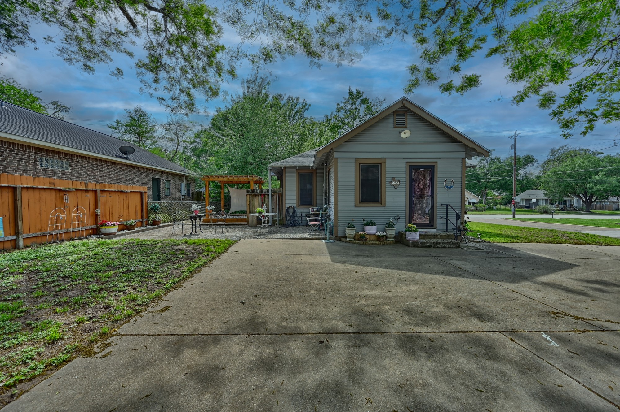 1501 South Austin Street Brenham, TX 77833 - Photo 29 of 36 a front view of house with yard and green space