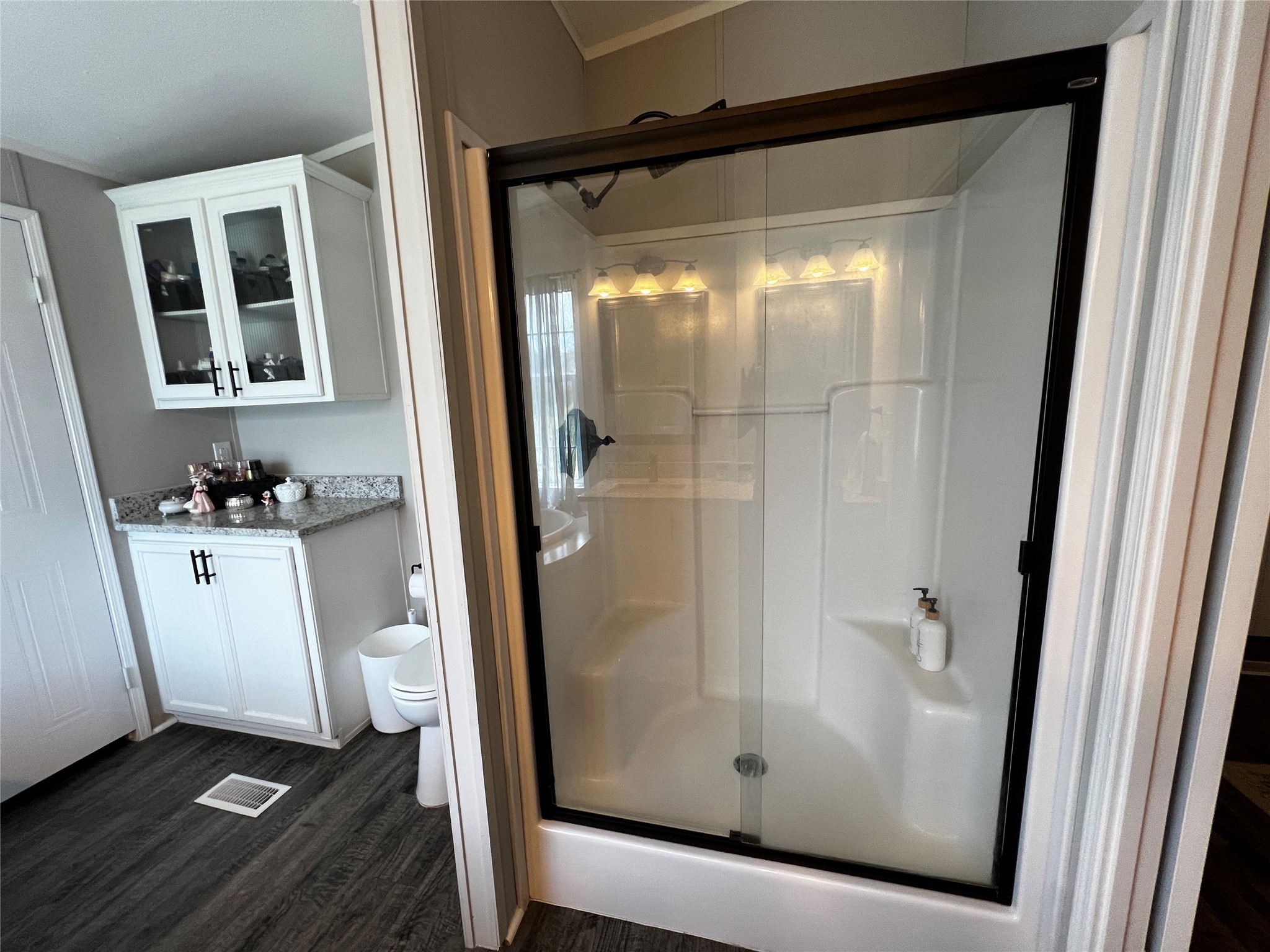 2346 Pr 1105 Midway, TX 75850 - Photo 15 of 25 a bathroom with a glass door shower and a sink