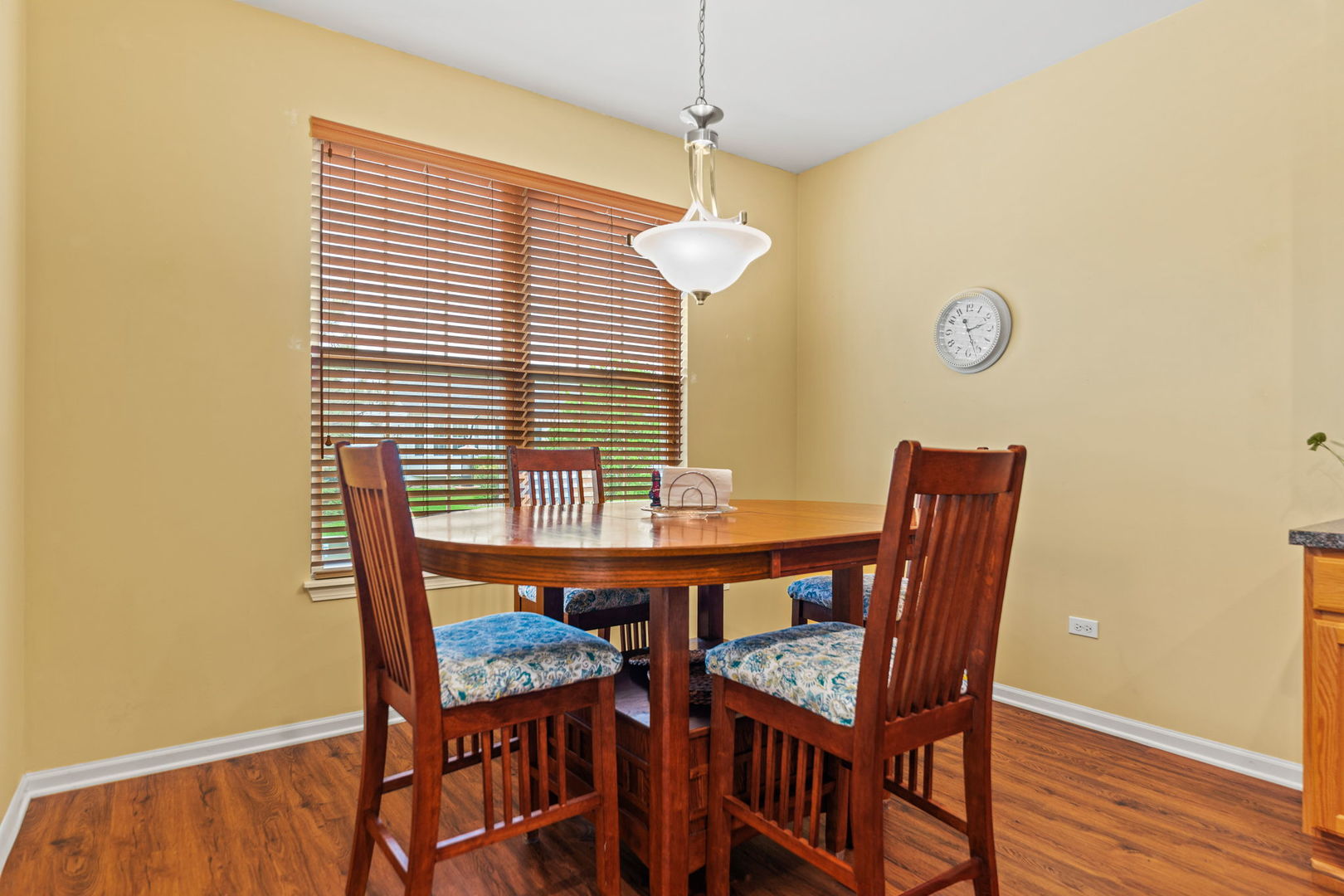 632 Tuscan View Drive Elgin, IL 60124 - Photo 13 of 52 a view of a dining room with furniture and wooden floor
