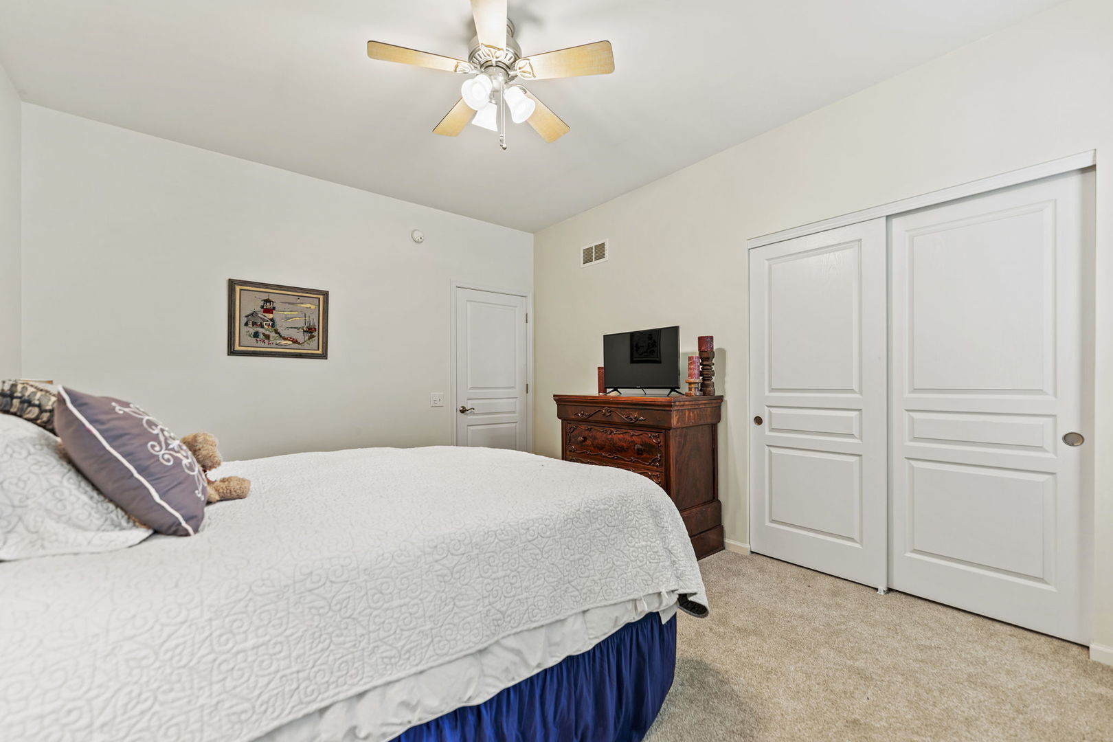 632 Tuscan View Drive Elgin, IL 60124 - Photo 22 of 52 a bedroom with a bed and a tv