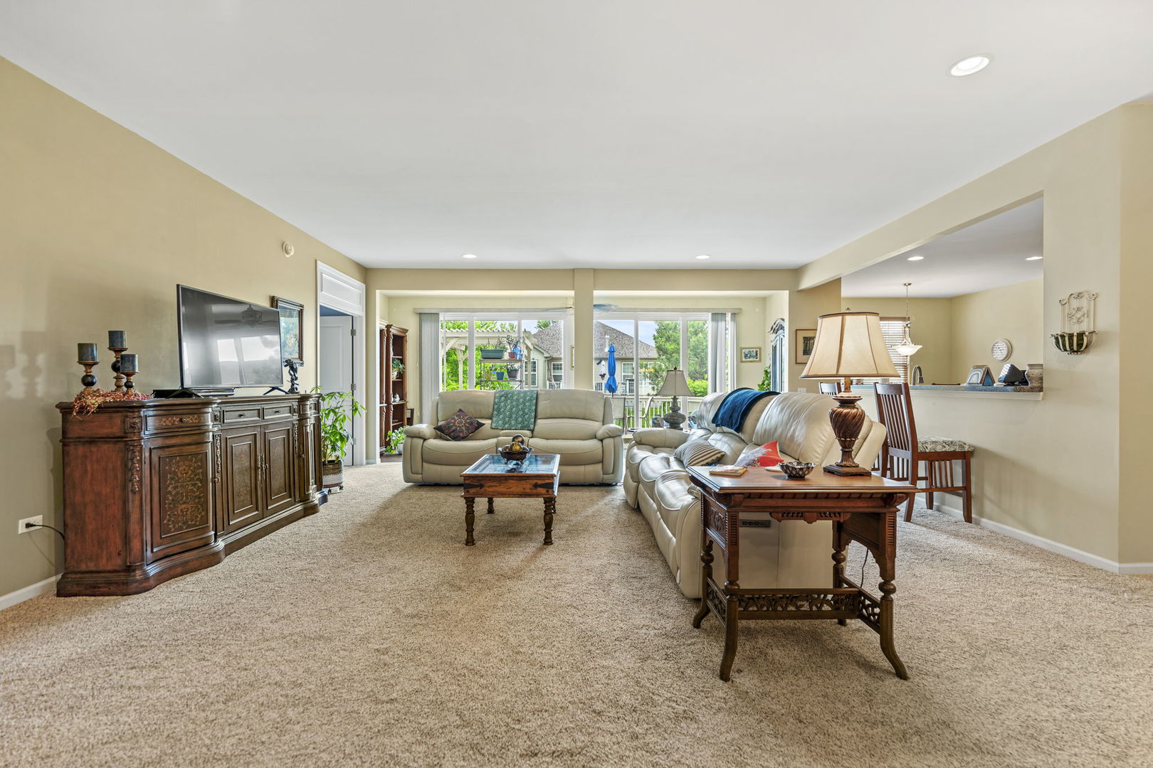 632 Tuscan View Drive Elgin, IL 60124 - Photo 8 of 52 a living room with furniture a large window and stainless steel appliances