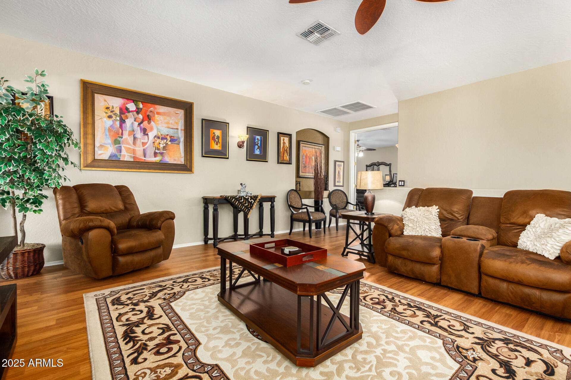 6635 South Cottonfields Lane Laveen, AZ 85339 - Photo 25 of 49 a living room with furniture a rug and a window