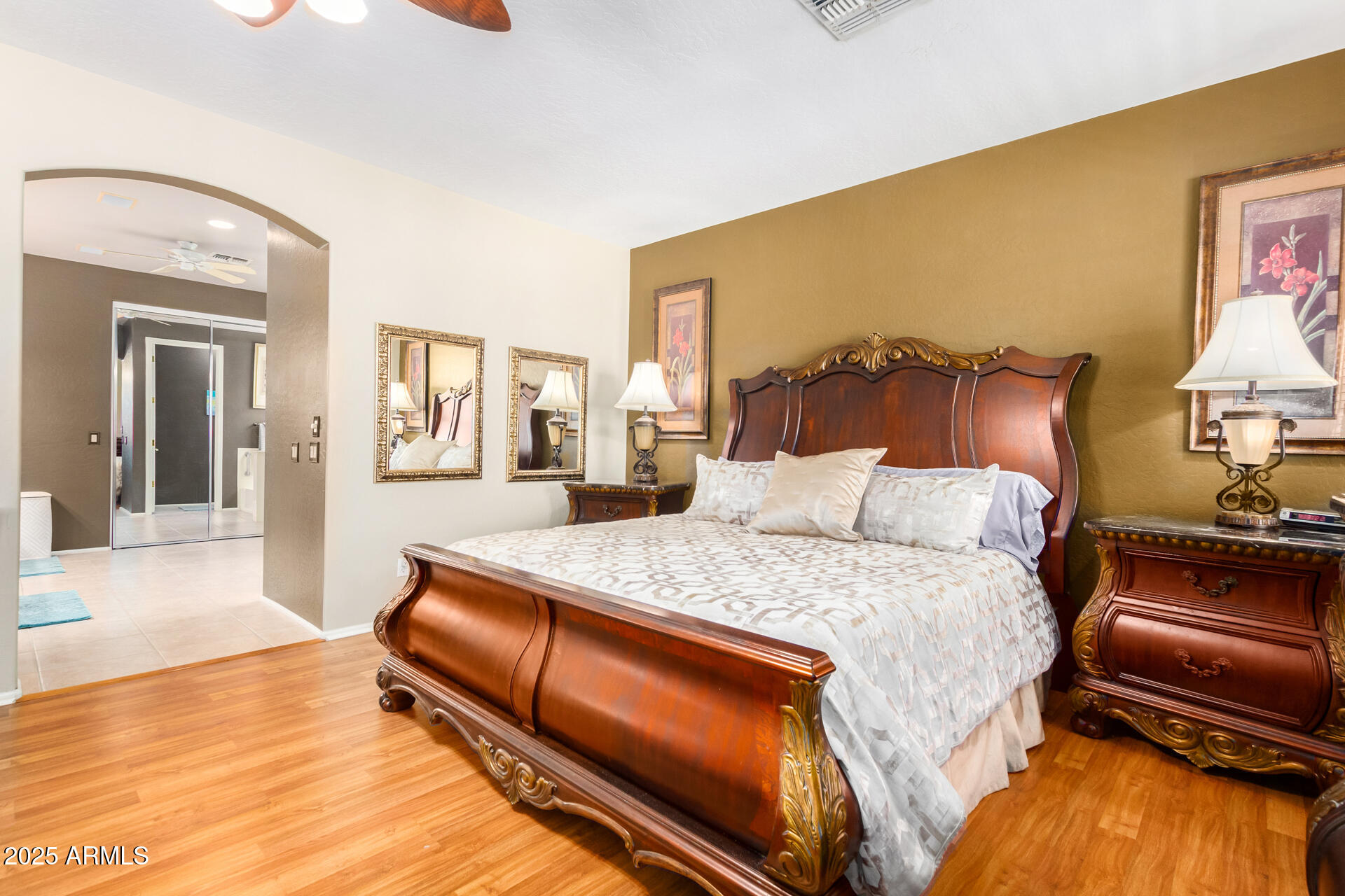 6635 South Cottonfields Lane Laveen, AZ 85339 - Photo 31 of 49 a bed room with a bed and a night stand